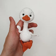 White goose  crochet pattern with christmas clothes