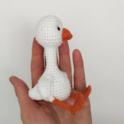 White goose  crochet pattern with christmas clothes