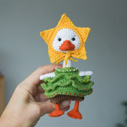 White goose  crochet pattern with christmas clothes