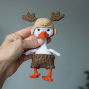 White goose  crochet pattern with christmas clothes