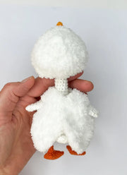 White goose  crochet pattern with christmas clothes