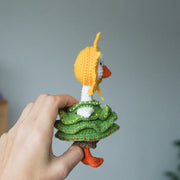White goose  crochet pattern with christmas clothes