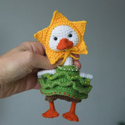 White goose  crochet pattern with christmas clothes